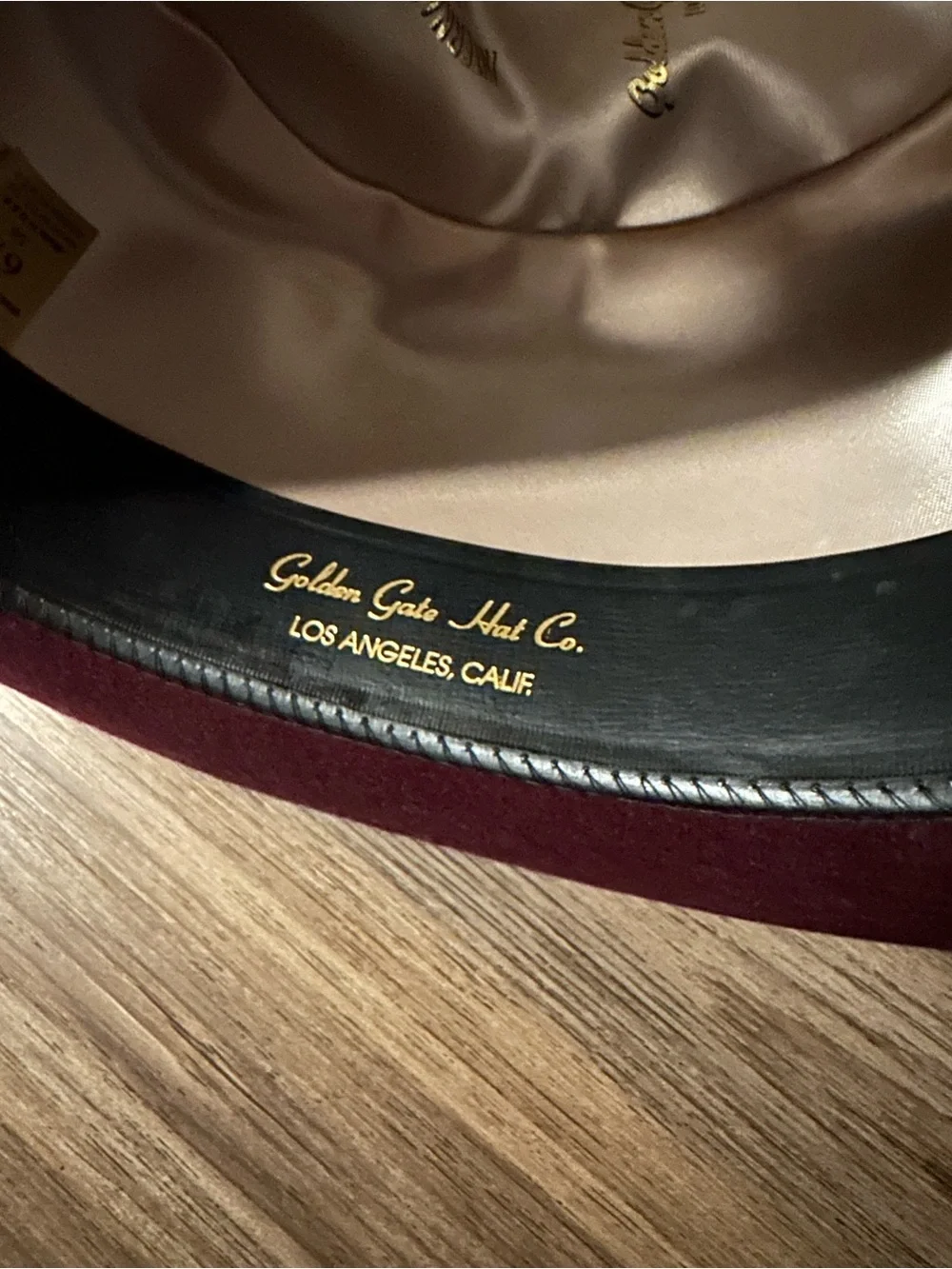 Golden gate hat co. Burgundy Wool  Bowler with Feather Trim. 100% wool.